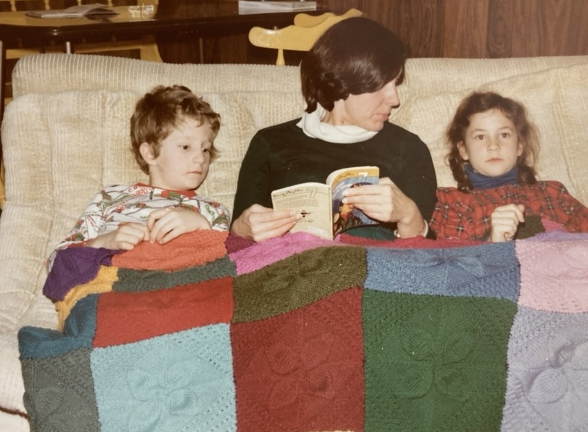 Sean, June and Caia, reading a story, January 1978